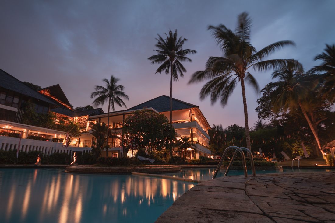 A calm resort setting at dusk